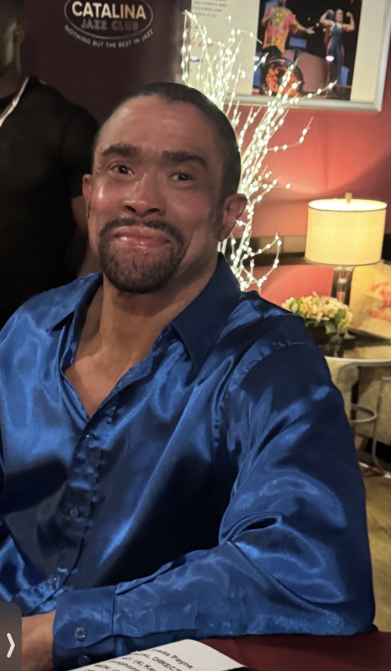Gregory Abbott Jr. in a blue satin shirt at Catalina Jazz Club